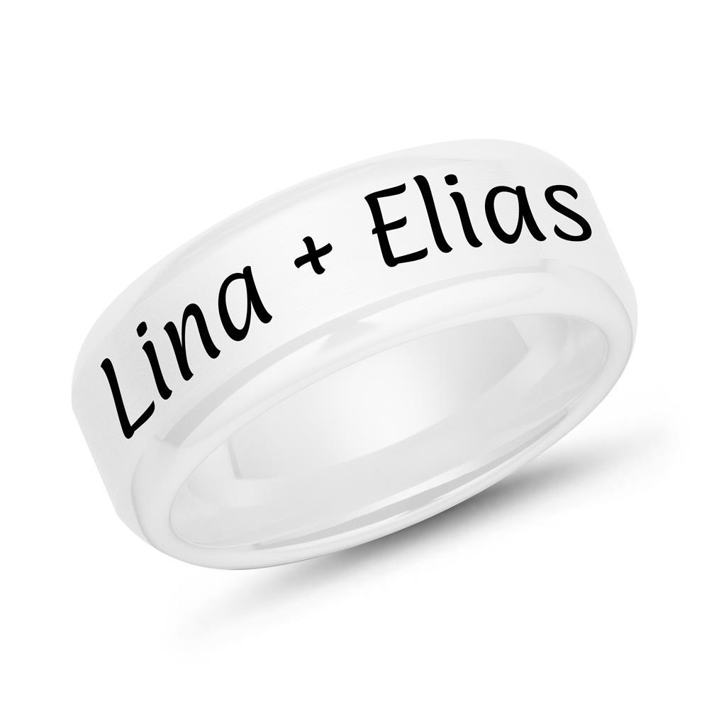White ceramic ring laser engraved with the names Lina and Elias